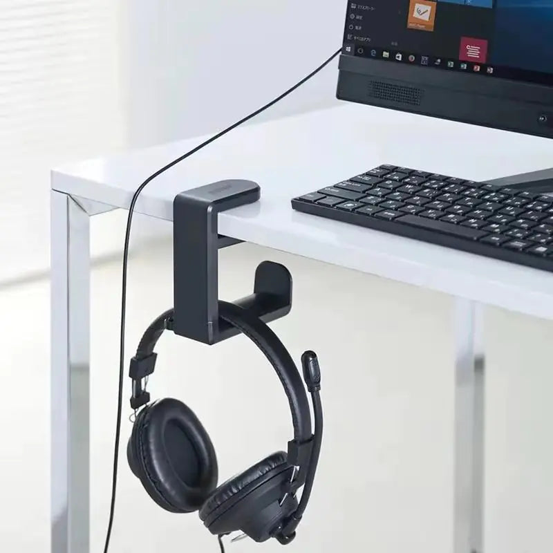 Headphone rack holding a headset