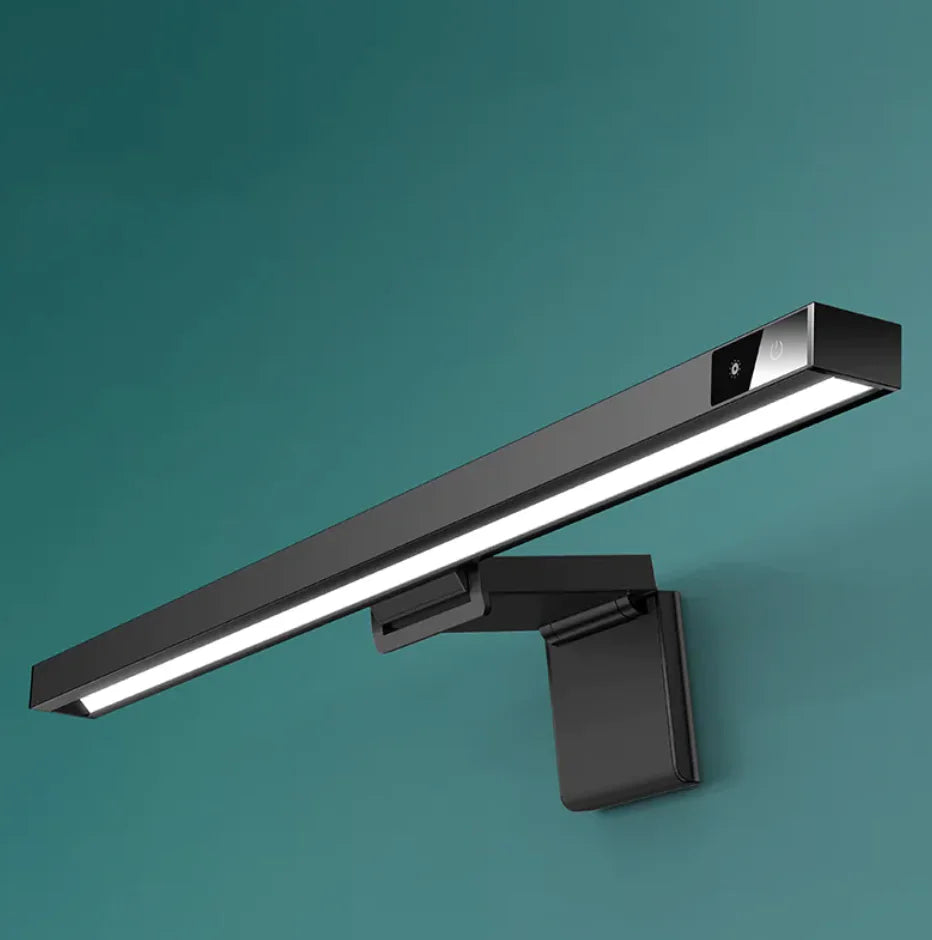 Monitor light bar lighting a desk