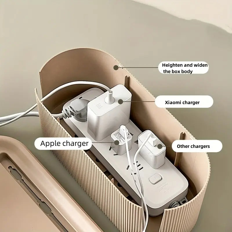 Cable management box hiding a power strip