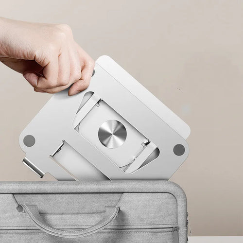 Adjustable aluminium laptop stand holding a laptop