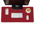 Leather desk mat under a keyboard and mouse